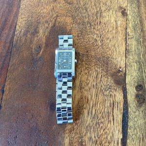 Baume and Mercier Woman’s Stainless steel band watch